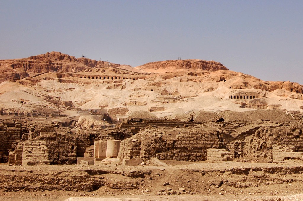 This photograph was taken at West Thebes.  It is a photograph of a pair of saf tombs as seen from the Ramesseum.  saf tombs typically date from the 11th to early 12th dynasties.